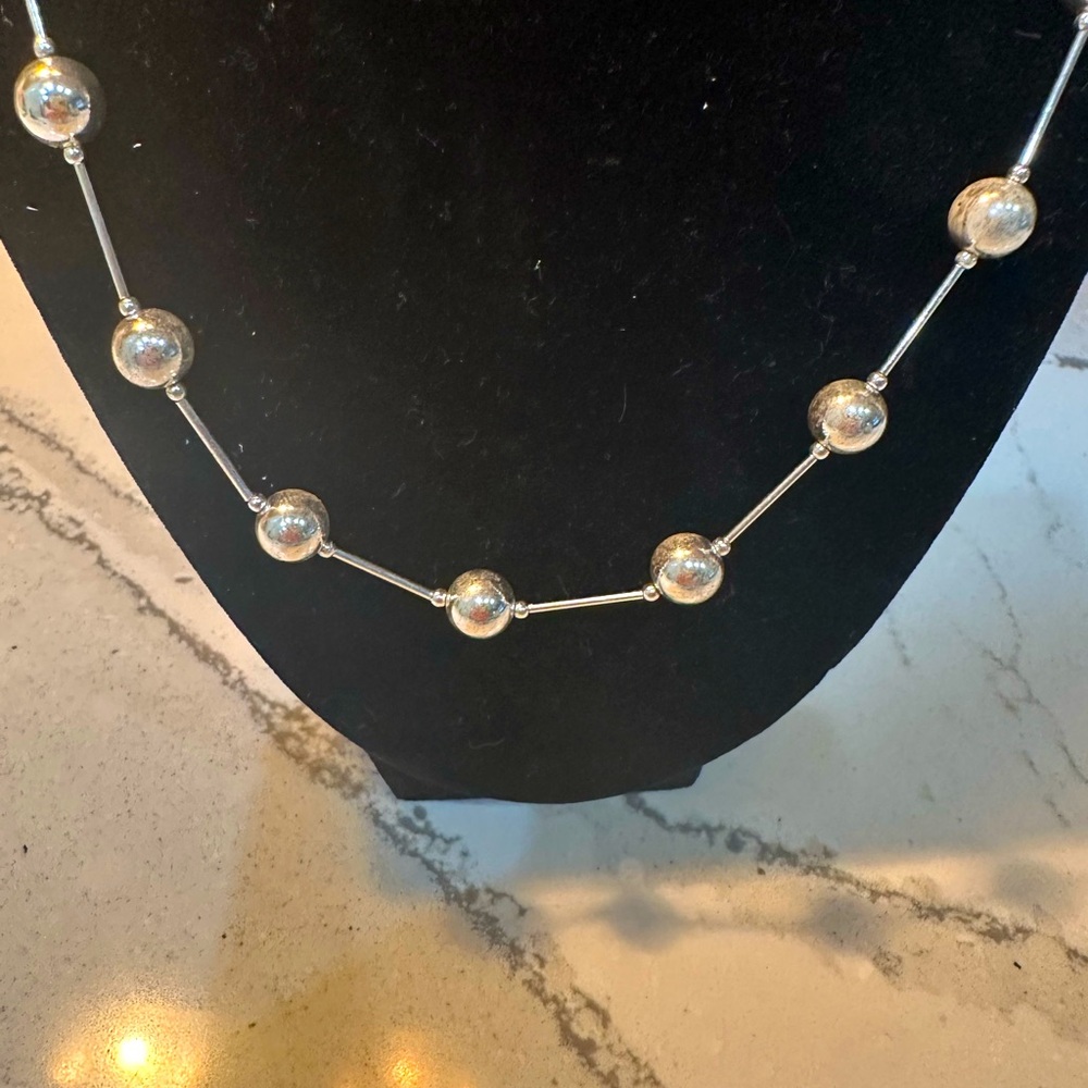 Silver and gold necklace brand new in box